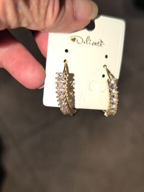 Delicate Gold Hoop Earrings with Clear Stones by Delicati